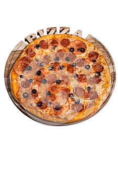 Italian pizza with salami olives and tomato. A series of different types of pizza for menus photographed from one angle