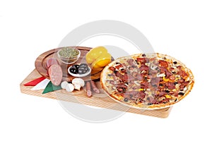 Italian pizza with sausage, salami, olive grass, herbs of Provence, spices, olives, mushrooms, sweet peppers,