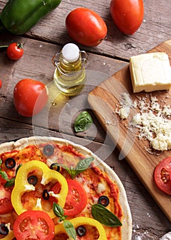Italian pizza with tomatoes, olive oil, and chesse