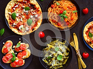 Italian platter-arrabiata spaghetti,alfredo pasta aglio olio ,bruschetta and margarita pizza photo