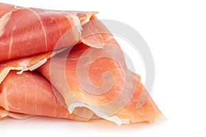 Italian prosciutto crudo or jamon. Raw ham. Isolated on white background