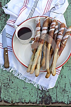 Italian prosciutto ham grissini bread sticks