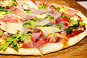 Italian prosciutto and rucola pizza.