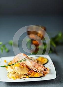 Italian ravioli and shrimp starter photo