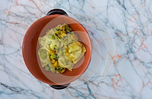 Italian ricotta-flavoured ravioli with bottarga