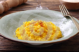 Italian risotto with saffron background photo