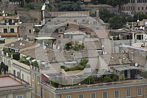 Italian rooftopgarden with clay tiles and balconies