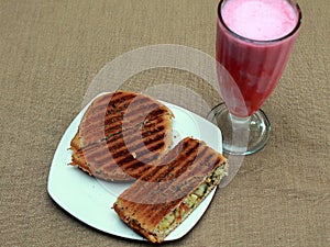 Italian sandwich pesto panino, fruit frappe