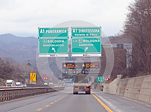Signal at crossroad and name of two way to Florence called DIRETTISSIMA OR Variante di Valico in Italy photo