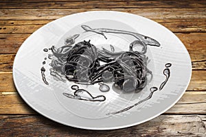 Italian spaghetti al nero di seppia, Black pasta squid ink photo