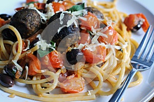 Italian spaghetti with meat balls and tomatoes