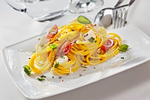 Italian spaghetti pasta with feta cheese