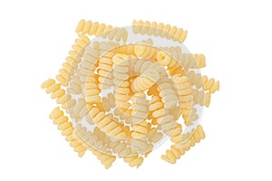 Italian spiral shaped pasta, Fusilli bucati macaroni, isolated on white background. Top view. Flat lay.