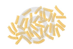 Italian spiral shaped pasta, Fusilli bucati macaroni, isolated on white background. Top view. Flat lay.