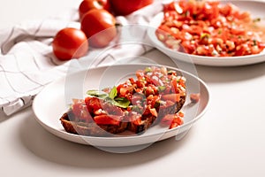 Italian starter bruschetta with fresh tomatoes, olive oil, garlic and basil