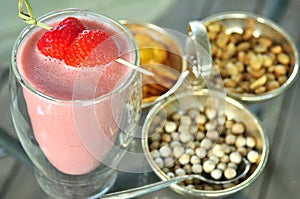 Italian strawberry cocktail with snack on a table in a restaurant