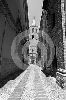 Italian street with church, alghero, italy photo