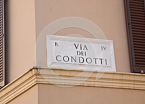 Italian Street Name of Via Condotti or officially Via dei Condot photo