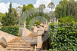 Italian style garden with a ornamental staircase. Mediterranean vegetation. Majorca, Spain.