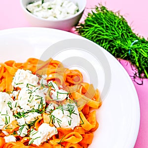 Italian Style Tagliatella Pasta With Feta Cheese photo