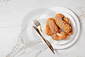 Italian suppli al telefono on a plate, copy space photo