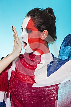 Italian supporter for FIFA 2014 wearing England flag