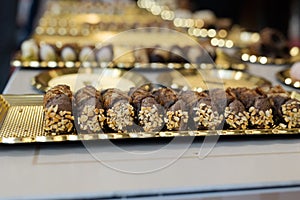 Italian Sweet Dessert, Traditional Sicilian Cannoli with Nuts and Chocolate Cream