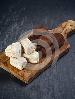 Italian tartufi on wood board photo