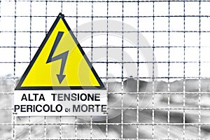 Italian Text Triangle Yellow Metal sign train deposit in italy e photo