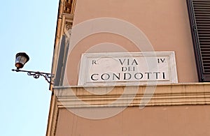 text of via CONDOTTI famous for the shops and the windows in Rom photo