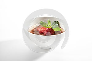 Italian Tiramisu Dessert with Green Fresh Mint and Sliced Strawberries