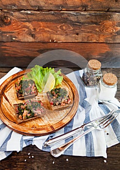 Italian tomato bruschetta with chopped vegetables, herbs and oil