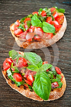 Italian tomato bruschetta with chopped vegetables