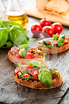 Italian tomato bruschetta with chopped vegetables