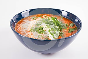 Italian tomato soup served with cream, mozzarella cheese and fresh parsley