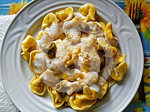 Italian tortellini stuffed with mortadela photo
