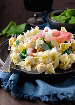 Italian traditional tortellini pasta Perline al prosciutto crudo