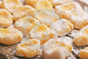 Italian uncooked homemade potato gnocchi with flour.