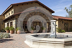 Italian villa fountain and courtyard plaza