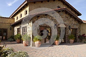Italian villa home and courtyard plaza photo