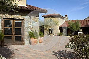 Italian villa home and courtyard plaza