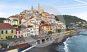 Italian village of Cervo's church and historic structures, seen from above using a drone