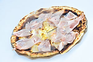 Italiana white focaccia pizza with cooked ham on white background