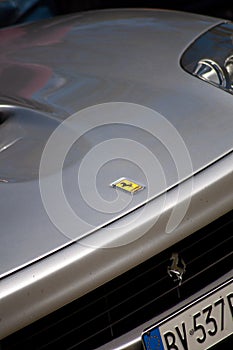 Close-up of Side view mirror and Logo Ferrari Sports Car. Ferrari is Italian sports car, Selective focus