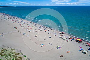 Italy, the beach of the Adriatic sea. Rest on the sea near Venice. Aerial FPV drone photography.