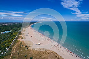 Italy, the beach of the Adriatic sea. Rest on the sea near Venice. Aerial FPV drone photography.