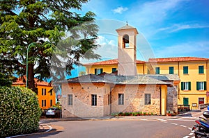 Italy Bellagio. Vintage chapel and yellow house