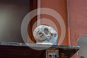 Italy, Cinque Terre, Vernazza, a statue of an owl to keep pigeons away