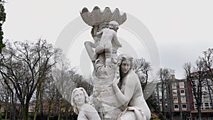 Italy, Cremona 14.03.2024. Sirens Monument in Cremona. Statues of women with children. Statue in the center of the old