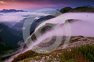 Italy, Dolomites - wonderful scenery, mountains in the early morning hazy photo